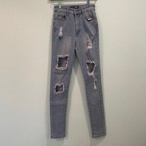 Fashion Nova size 5/5‎ distressed jeans with stretch